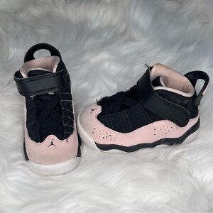 Baby’s Jordan Black and Pink Sneakers